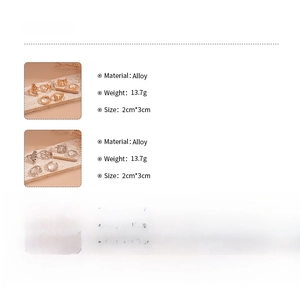 Detailed size and weight specifications for gold and silver shell alloy ring set