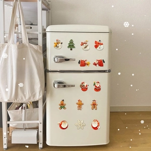 Christmas magnetic fridge stickers set featuring Santa, snowman, and reindeer on fridge
