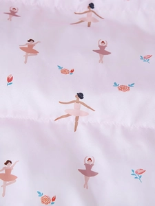 Macro detail of ballerina and floral print on soft light pink quilted jacket fabric