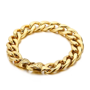 Close-up of golden stainless steel Cuban link bracelet with engraved vintage clasp buckle