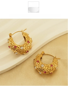 Detail of 18K gold plated hoop earrings with cross-grid pattern and pink zircon stones