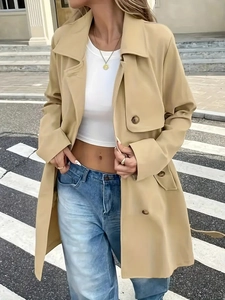 Elegant khaki long trench coat with waist belt and classic lapels for women