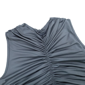 Detail shot of the elegant ruched chest design on a grey sleeveless maxi dress fabric