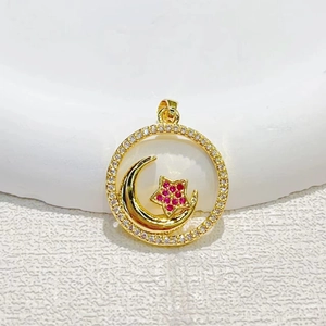 Gold-plated moon and star pendant with colorful cubic zirconia and sparkling white crystals