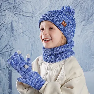 Kids winter knit set with pom-pom hat, scarf, and gloves in blue white blend yarn