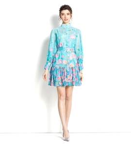 Detail of light blue floral dress with stand collar, puff sleeves and a matching belt