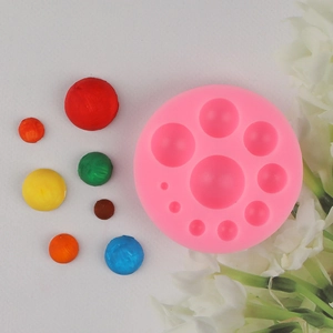 Pink silicone pearl half-sphere mold for DIY cake decorating and chocolate baking