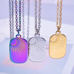 Three sun and moon stainless steel rectangle pendants in gold, silver and colorful purple