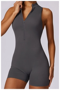 Detail of dark grey sleeveless yoga bodysuit featuring a front zipper and slim fit cut