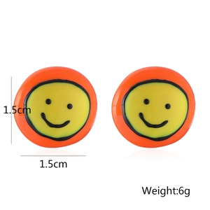 Boucles d'oreilles sourire plaquées or avec finition émail orange et jaune