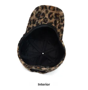 Detail view of leopard print baseball cap featuring soft lining and internal stitching