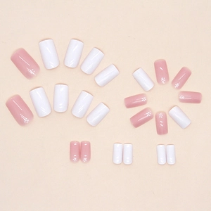Pink floral and white glitter press-on nail kit in medium length with square oval shape