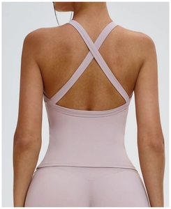 Close-up of light purple yoga vest with wide cross-back straps for stable support
