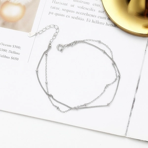 Elegant S925 sterling silver double-layered bead bracelet with adjustable chain link