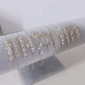 Elegant gold zircon headband set with pearls, floral designs and long metallic tassels