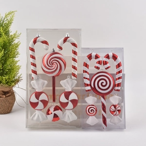 Red and white Christmas candy ornaments set with glitter canes and lollipops for tree decor