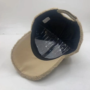 Internal view of khaki faux cashmere baseball cap with shape support and washing label
