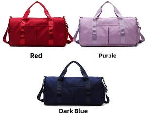 Detailed view of red, purple, and blue waterproof nylon gym bags with adjustable straps