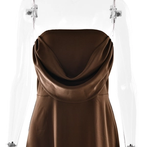 Detail of the elegant cowl neck draping on a brown sleeveless satin evening dress