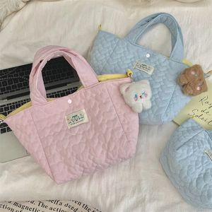 Detailed heart quilted fabric tote bag with cute plush bear charms and button closure