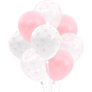 Close-up of pink and white latex balloons featuring elegant bow prints for party decor