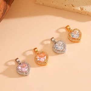 Elegant gold and silver heart-shaped pendant necklaces with sparkling zircon inlay
