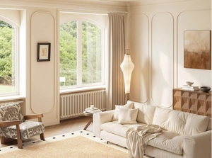 French vintage carpet detail in modern living room with cream sofa and retro chair