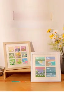Detail of square wood oil painting frames in natural wood and white finish