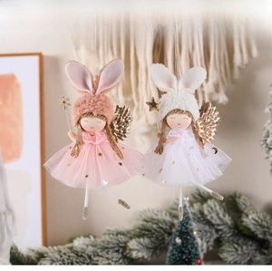 Pink and white Christmas angel dolls with rabbit ear hats and sequined tulle skirts
