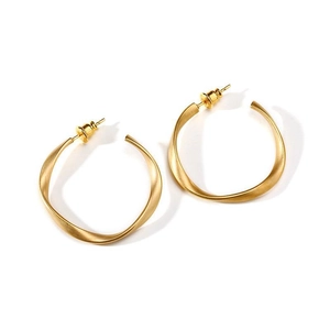 Matte gold twisted C-shaped hoop earrings in titanium steel with a minimalist spiral design