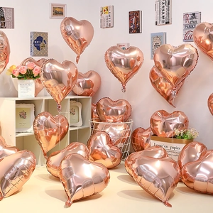 Romantic rose gold heart-shaped foil balloons for engagement and birthday party decor