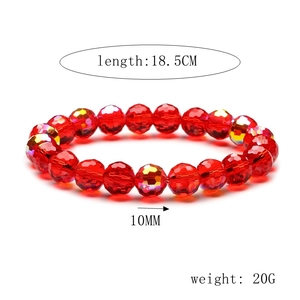 Detail of 10mm faceted red crystal beads with rainbow coating for DIY jewelry making