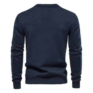 Detail view of the navy blue men's knit sweater back side with premium ribbed texture