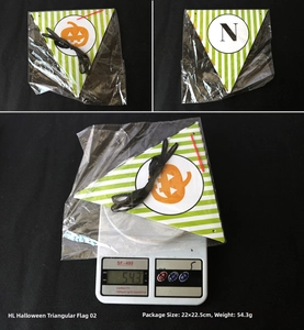 Detail of Halloween triangle banner showing green white stripes and orange pumpkin print