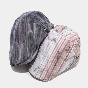 Distressed striped newsboy flat cap for men and women with vintage washed cotton texture