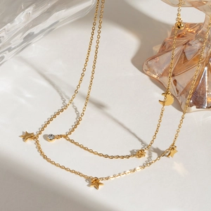 Double-layered gold stainless steel necklace with star, moon charms and zircon pendant