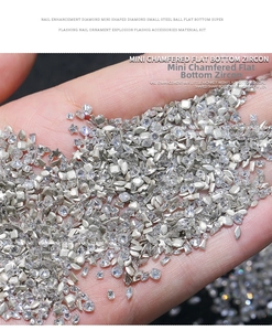 Macro shot of 5A mini mixed shapes zircon nail art crystals with flat back silver glitter