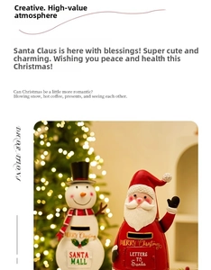 Detailed view of Santa and Snowman metal mailboxes for festive Christmas scene decoration