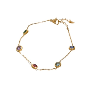 Elegant 18K gold-plated titanium steel bracelet with five colorful round gemstones on a thin chain
