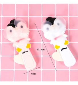 Detailed dimensions of portable hand-press mini penguin fans for kids 13.3cm by 6cm
