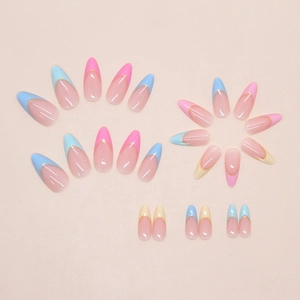 Rainbow French tip press on nails in long almond shape with gold line accents
