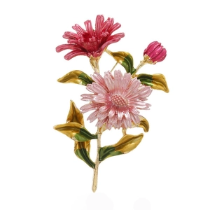 Floral enamel brooch featuring pink and red flowers with golden leaves on white background