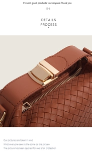 Macro shot of brown woven leather texture with a gold metal push-lock and zipper detail