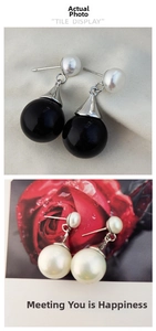 Detail of French vintage earrings with natural freshwater pearls and elegant black beads