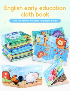 Detail of washable soft cloth books for babies with crinkle paper and dinosaur themes