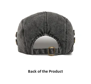 Detail of the adjustable rear strap and vintage metal buckle on a washed denim ivy cap