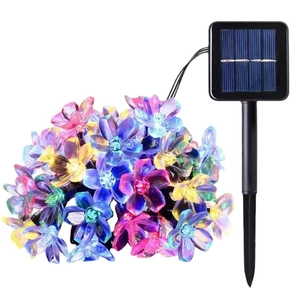 Outdoor solar powered LED cherry blossom string lights with colorful flower decorations