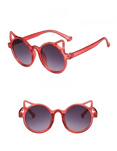 Detailed views of red transparent cat-ear sunglasses for kids with grey gradient lenses