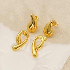 Polished gold comma and teardrop stud earrings in minimalist stainless steel set