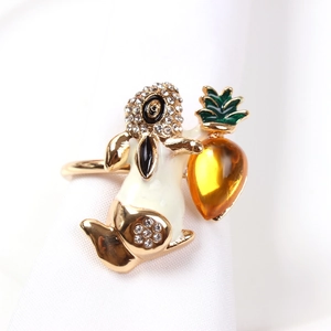 Golden bunny napkin ring with rhinestones and yellow crystal carrot for table decor